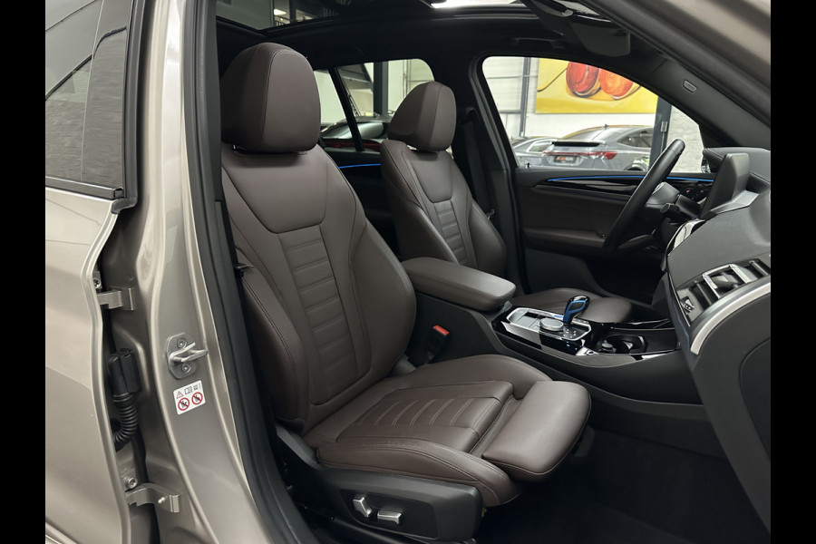 BMW iX3 M-Sport 80 kWh | Panorama | 360 Camera | ACC | Leder | 99% SOH | Head-Up | Keyless-Entry | Harman-Kardon | Memory | Dodehoek | 3-Zone Clima | Sfeerverlichting | Carplay | ISO-Glas | Draadloos Laden | Bovag Garantie |