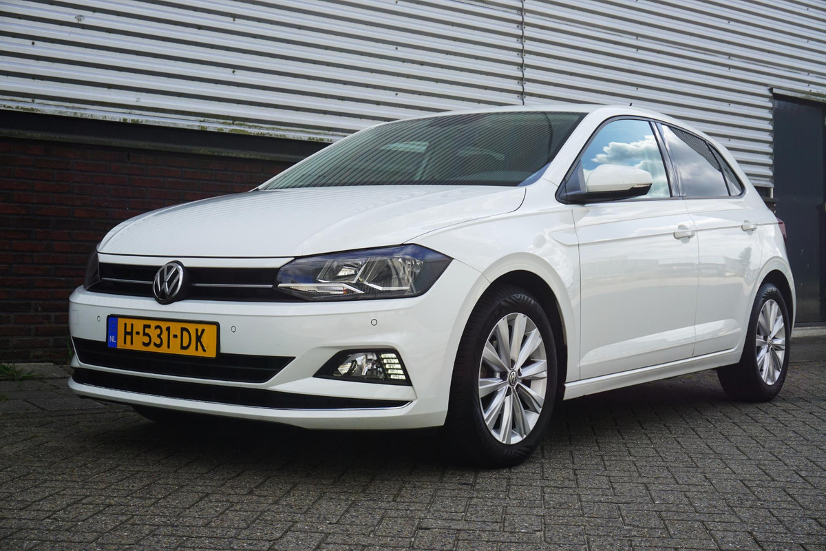 Volkswagen Polo 1.0 TSI Highline/Digi-Dash./PDC voor+achter/ Navigatie.