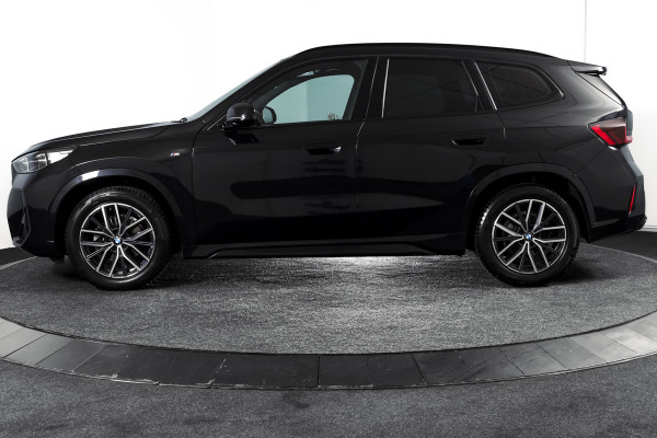 BMW X1 sDrive18i 136 PK | M-Sport | Afn. Trekhaak | Dig. Cockpit | Cruise | PDC | Camera | NAV + App. Connect | ECC | Elek. Klep | LM 18" |