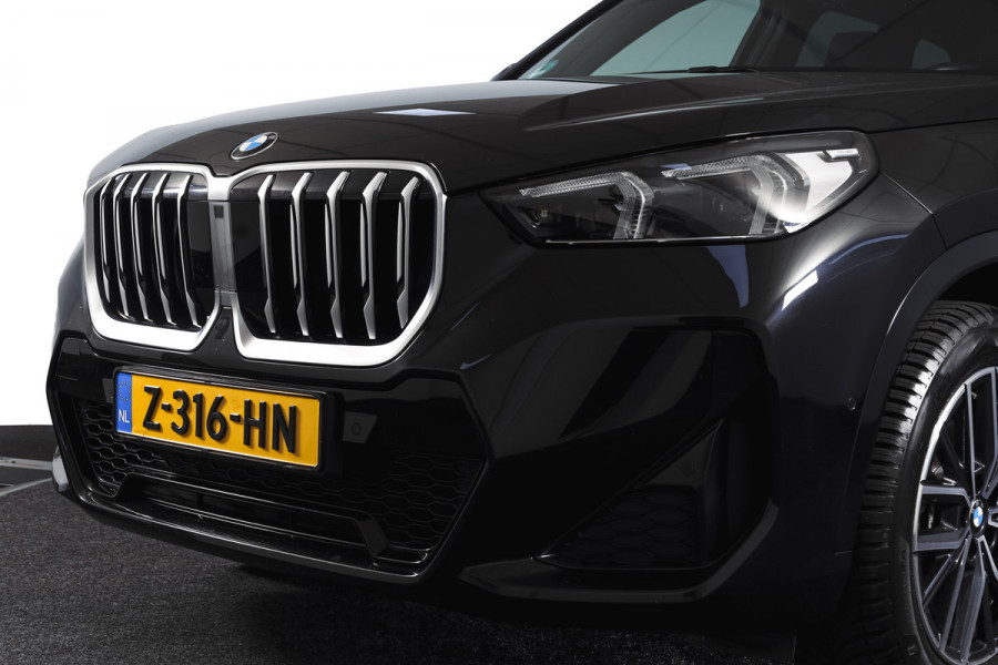 BMW X1 sDrive18i 136 PK | M-Sport | Afn. Trekhaak | Dig. Cockpit | Cruise | PDC | Camera | NAV + App. Connect | ECC | Elek. Klep | LM 18" |