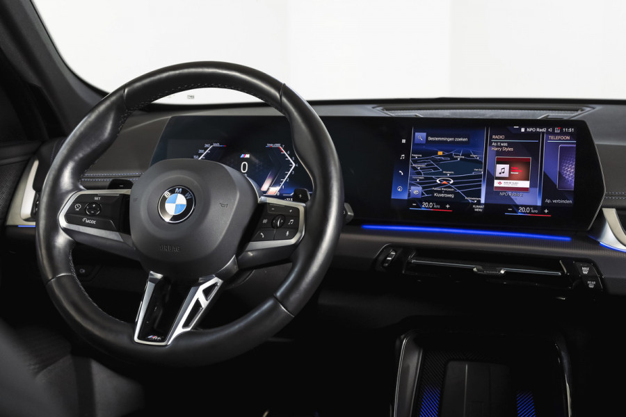 BMW X1 sDrive18i 136 PK | M-Sport | Afn. Trekhaak | Dig. Cockpit | Cruise | PDC | Camera | NAV + App. Connect | ECC | Elek. Klep | LM 18" |