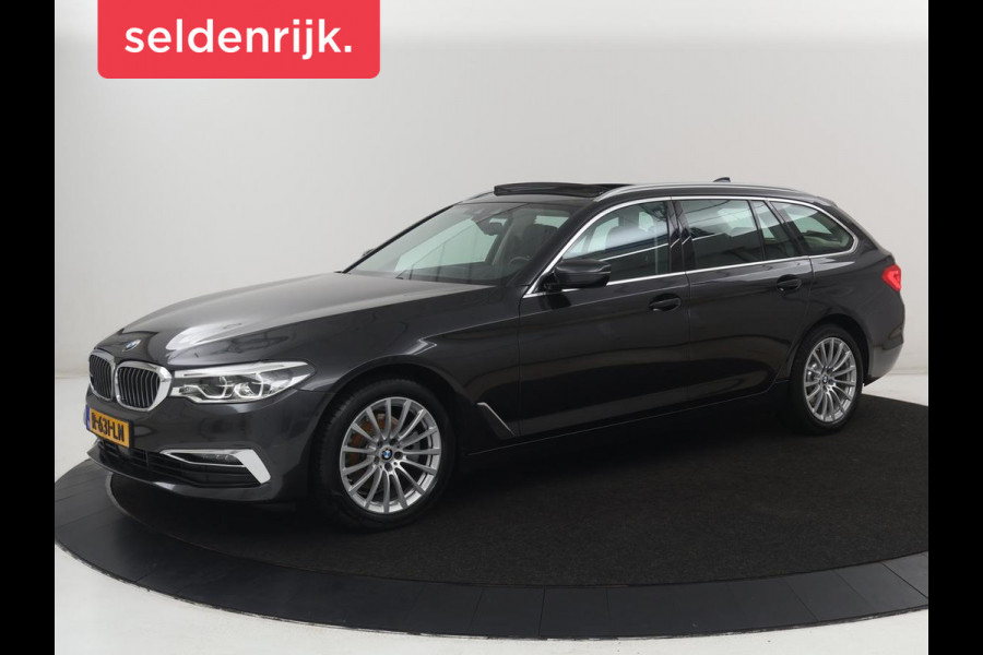 BMW 5 Serie Touring 520i High Executive | Panoramadak | Trekhaak | Head-Up | Stoelventilatie | Stoel & Stuurverwarming | Adaptive cruise | Navigatie | DAB+ | Carplay | Sfeerverlichting | Park assist | Climate control