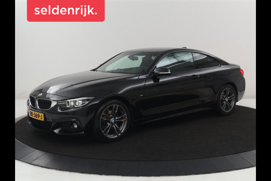 BMW 4 Serie Coupé 418i High Executive M-sport | Stoelverwarming | Leder | Cruise control | Park assist | Sfeerverlichting | Climate control | Navigatie |