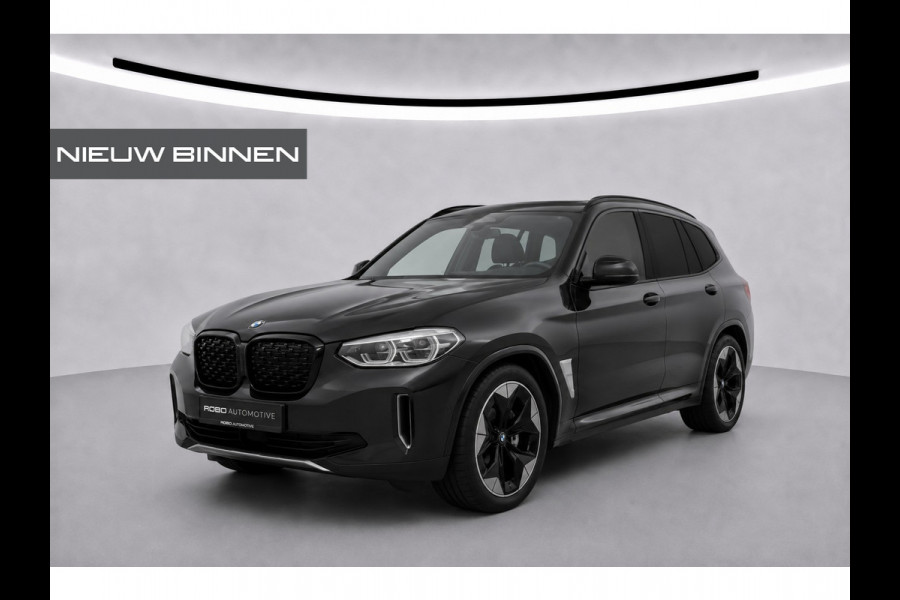 BMW iX3 High Executive 80 kWh | Panoramadak | Harman Kardon | Head-Up Display | Adaptive Cruise Control | Stoelverwarming | Dodehoekdetectie | Keyless | Trekhaak | Adaptief Onderstel | 360 Camera | Ambiance Verlichting |