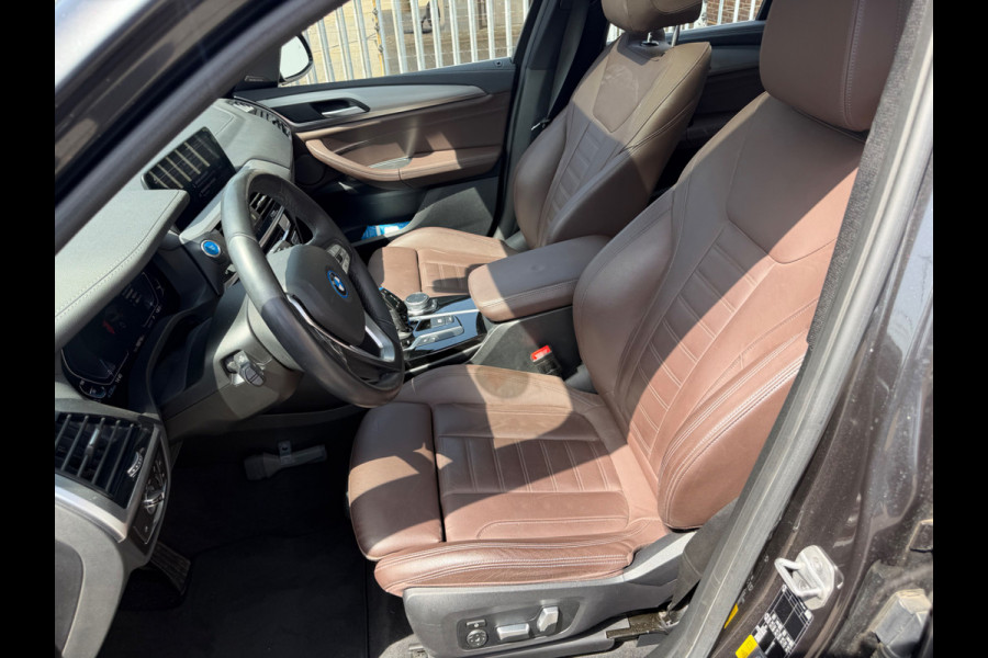 BMW iX3 High Executive 80 kWh | Panoramadak | Harman Kardon | Head-Up Display | Adaptive Cruise Control | Stoelverwarming | Dodehoekdetectie | Keyless | Trekhaak | Adaptief Onderstel | 360 Camera | Ambiance Verlichting |