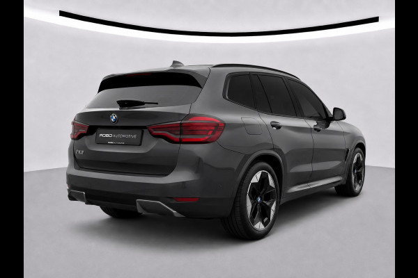 BMW iX3 High Executive 80 kWh | Panoramadak | Harman Kardon | Head-Up Display | Adaptive Cruise Control | Stoelverwarming | Dodehoekdetectie | Keyless | Trekhaak | Adaptief Onderstel | 360 Camera | Ambiance Verlichting |