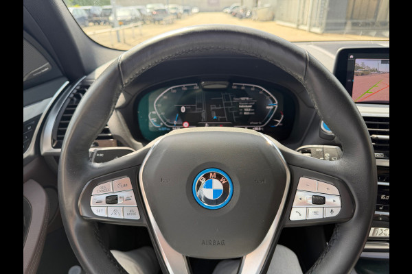 BMW iX3 High Executive 80 kWh | Panoramadak | Harman Kardon | Head-Up Display | Adaptive Cruise Control | Stoelverwarming | Dodehoekdetectie | Keyless | Trekhaak | Adaptief Onderstel | 360 Camera | Ambiance Verlichting |