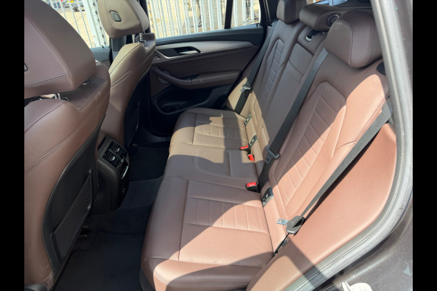 BMW iX3 High Executive 80 kWh | Panoramadak | Harman Kardon | Head-Up Display | Adaptive Cruise Control | Stoelverwarming | Dodehoekdetectie | Keyless | Trekhaak | Adaptief Onderstel | 360 Camera | Ambiance Verlichting |