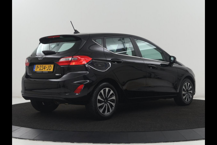 Ford Fiesta 1.0 EcoBoost Hybrid Titanium | Cruise control | Park assist | Climate control | Navigatie | Carplay | Lederen stuurwiel | Lane assist |