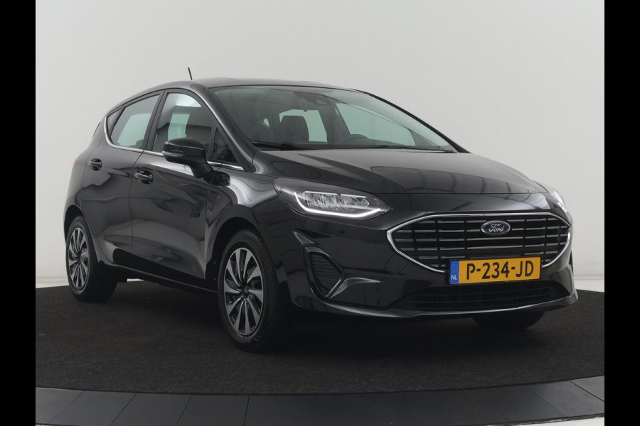 Ford Fiesta 1.0 EcoBoost Hybrid Titanium | Cruise control | Park assist | Climate control | Navigatie | Carplay | Lederen stuurwiel | Lane assist |