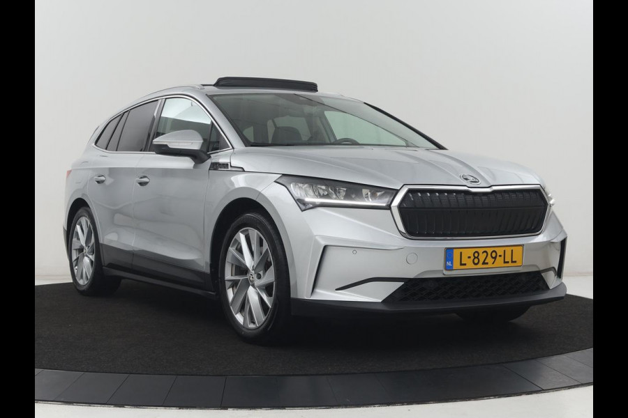 Škoda Enyaq iV 60 | SOH 92,4% | Panoramadak | Stoel/stuur verwarming | Half leder | Adaptive cruise | Carplay | Virtueel dashboard | Sfeerverlichting | Climate control | Camera | Park assist |