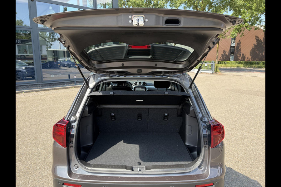 Suzuki Vitara 1.5 Hybrid Select 1E EIGENAAR | ORIGINEEL NEDERLANDSE AUTO | RESTERENDE FABRIEKSGARANTIE T/M 07-2035 | ADAPTIVE CRUISE CONTROL | STOELVERWARMING | ACHTERUITRIJCAMERA