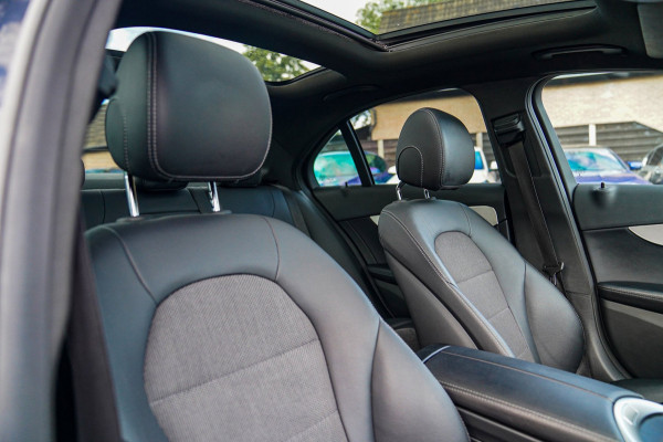 Mercedes-Benz C-Klasse 180 Sport Edition Premium Plus | Dubbele Panorama | AMG Pakket | Stoelverwarming | Xenon / LED | Sfeerverli