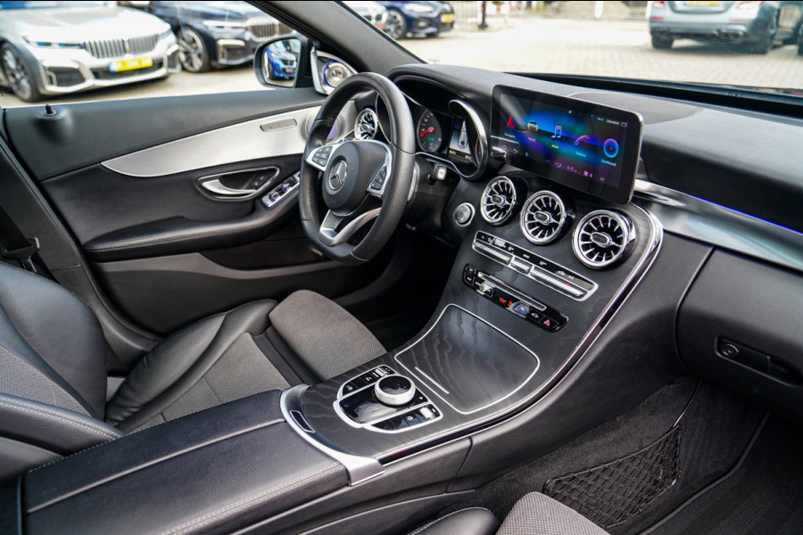 Mercedes-Benz C-Klasse 180 Sport Edition Premium Plus | Dubbele Panorama | AMG Pakket | Stoelverwarming | Xenon / LED | Sfeerverli