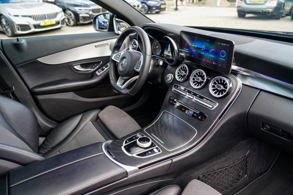 Mercedes-Benz C-Klasse 180 Sport Edition Premium Plus | Dubbele Panorama | AMG Pakket | Stoelverwarming | Xenon / LED | Sfeerverli
