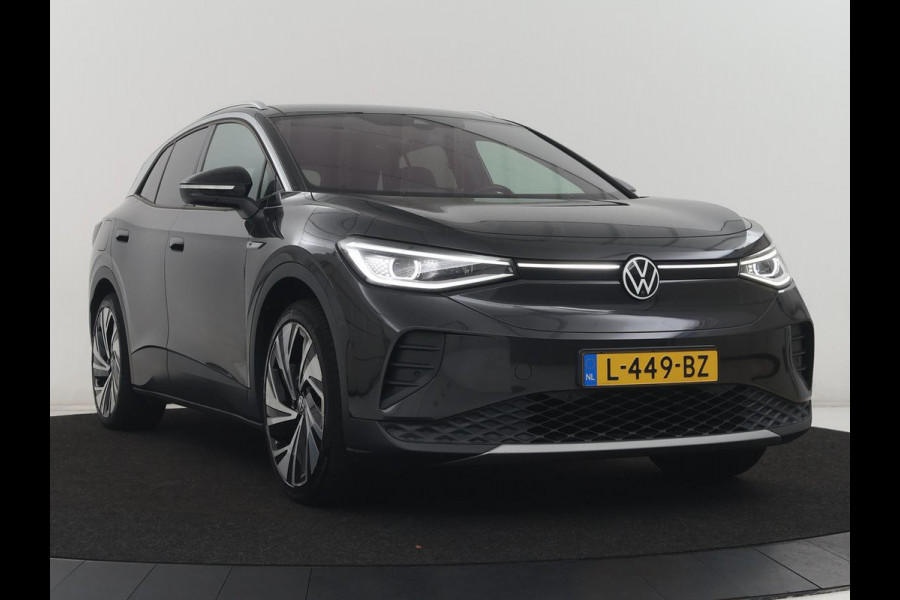 Volkswagen ID.4 First Max 77 kWh | SOH 91,9% | Panoramadak | Leder/alcantara | Memory | Stuur/stoel verwarming | Adaptive cruise | 360 camera | Dodehoek detectie | Carplay | Sfeerverlichting |