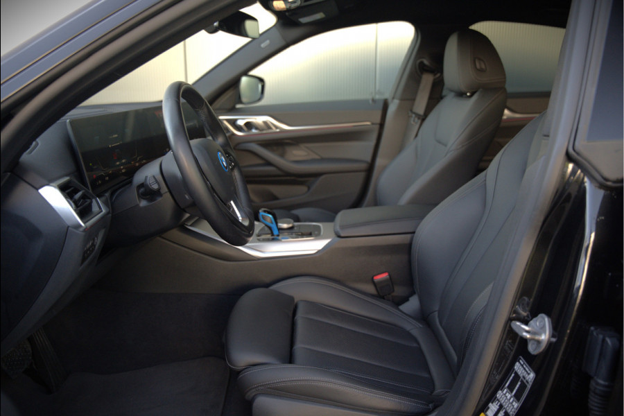 BMW i4 eDrive40 84 kWh | Stoelverwarming | Stuurverwarming | Apple Carplay | Adaptive Cruise Control | Memory Seat | Trekhaak | Camera | Parkeersensoren | Navigatie | Ambiance Verlichting | HIFI | SOH 96.52% |