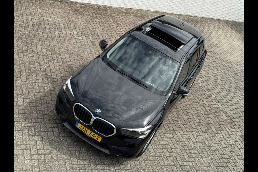 BMW X1 SDrive 1.8i High Executive Head Up display Climate Cruise Pano Leer Navi PDC voor en achter