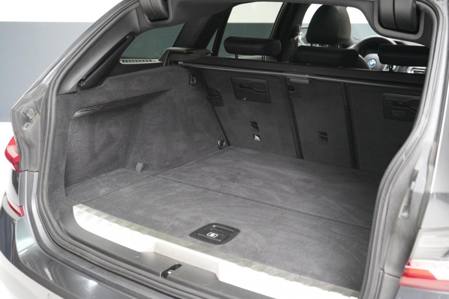 BMW 3 Serie Touring 330e High Executive | SoH 90% | Panoramadak | Trekhaak | Memory | Stuurverwarming | Carplay | Stoelverwarming