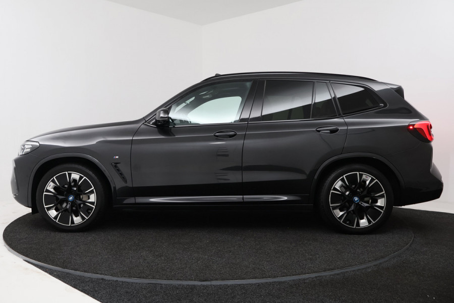 BMW iX3 High Executive 80 kWh (PANORAMADAK, 360 CAMERA, SFEERVERLICHTING, ADAPTIVE CRUISE, TREKHAAK WEGKLAPBAAR, AUTOPILOT)