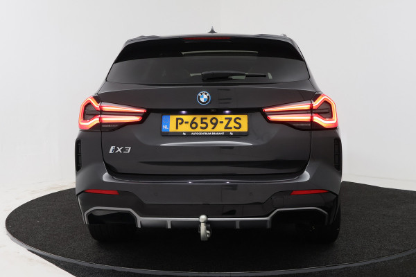 BMW iX3 High Executive 80 kWh (PANORAMADAK, 360 CAMERA, SFEERVERLICHTING, ADAPTIVE CRUISE, TREKHAAK WEGKLAPBAAR, AUTOPILOT)