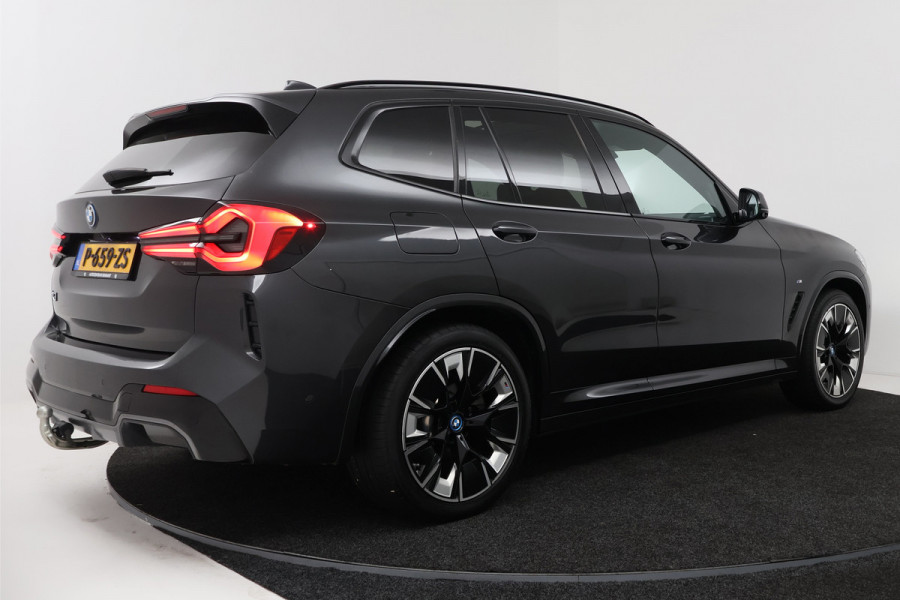 BMW iX3 High Executive 80 kWh (PANORAMADAK, 360 CAMERA, SFEERVERLICHTING, ADAPTIVE CRUISE, TREKHAAK WEGKLAPBAAR, AUTOPILOT)