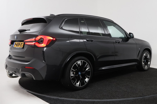 BMW iX3 High Executive 80 kWh (PANORAMADAK, 360 CAMERA, SFEERVERLICHTING, ADAPTIVE CRUISE, TREKHAAK WEGKLAPBAAR, AUTOPILOT)