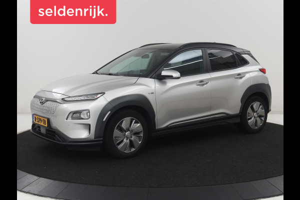 Hyundai Kona EV Fashion Design 64 kWh | SOH 94.6% | Leder | Head-up | Trekhaak | Adaptive cruise | Carplay | Stoelverwarming | Krell Sound | Dodehoek detectie |