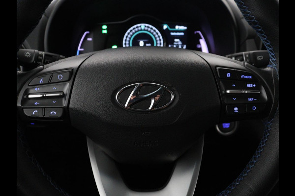 Hyundai Kona EV Fashion Design 64 kWh | SOH 94.6% | Leder | Head-up | Trekhaak | Adaptive cruise | Carplay | Stoelverwarming | Krell Sound | Dodehoek detectie |