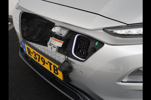 Hyundai Kona EV Fashion Design 64 kWh | SOH 94.6% | Leder | Head-up | Trekhaak | Adaptive cruise | Carplay | Stoelverwarming | Krell Sound | Dodehoek detectie |