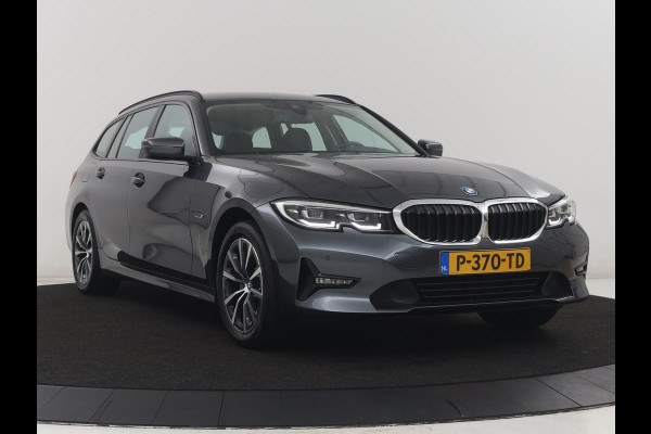 BMW 3 Serie Touring 320e Business Edition Plus | SOH 90% | Leder | Stoelverwarming | Carplay | Cruise control | Climate control | Elektrische achterklep | Park assist | PHEV