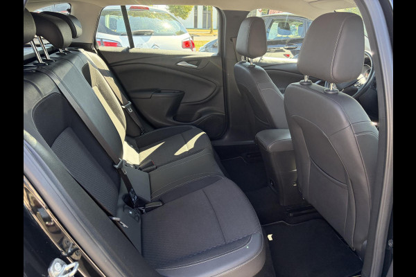 Opel Astra Sports Tourer 1.4 Business Executive 2e Eigenaar l 150pk l Carplay l Navi l Pdc V+A l Stoelvw-Stuurverw l Clima l Cruise l 18''Lmv l Halfleder l 6 Bak l Rijstrooksensor l N.A.P l Apk tot 08-2027
