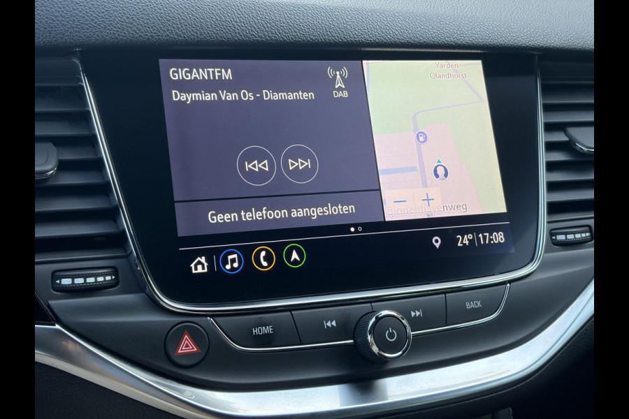 Opel Astra Sports Tourer 1.2 Ultimate 2e Eigenaar l Trekhaak l Camera l Carplay l Navi l Alcantara-Leder l 17''Lmv l Stoelverw-Stuurverw l Net beurt gehad l Dodehoek l Rijstrooksensor l Pdc V+A l 6 Bak l N.A.P l 146pk l Bj 11-2020 l Apk tot 08-2028