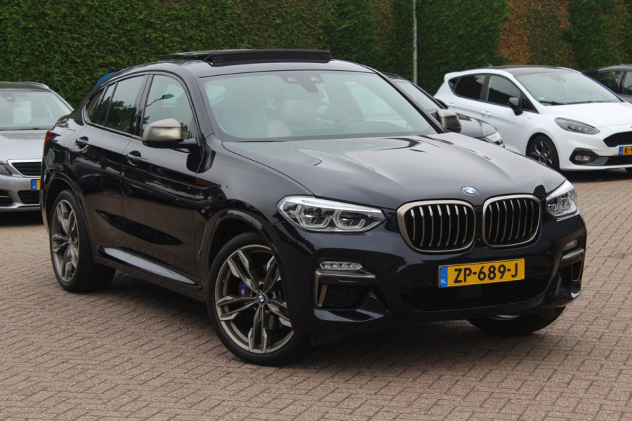 BMW X4 M40i High Exe. M Sport 73.952 km NL Auto. / Trekhaak / Panoramadak / Camera / Head-up / Luxe Leder / 21'' / Harman Kardon / Navigatie / Stuur+Stoelverwarming / DAB / Dodehoek / Cruise Control