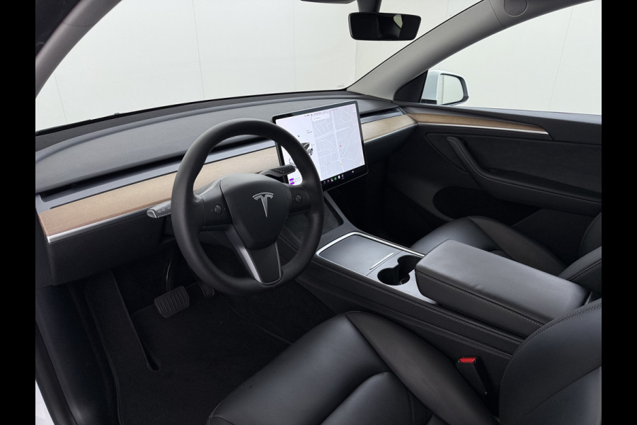 Tesla Model Y Long Range AWD 75kWh 514PK Warmtepomp Stuur+Stoel+Achterbankverwarming Panoramadak Camera's Adap.Cruise Navi Ecc Premium-Audio L Keyless Intel Atom®-Processor Privacy Glas Lmv Matrix Led Dodehoekdetectie