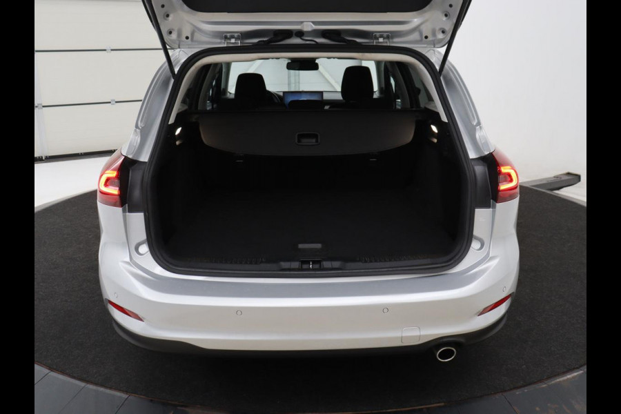 Ford Focus Wagon 1.0 EcoBoost Hybrid Titanium | Cruise control | Lane assist | Navigatie | Carplay | Park assist | Climate control