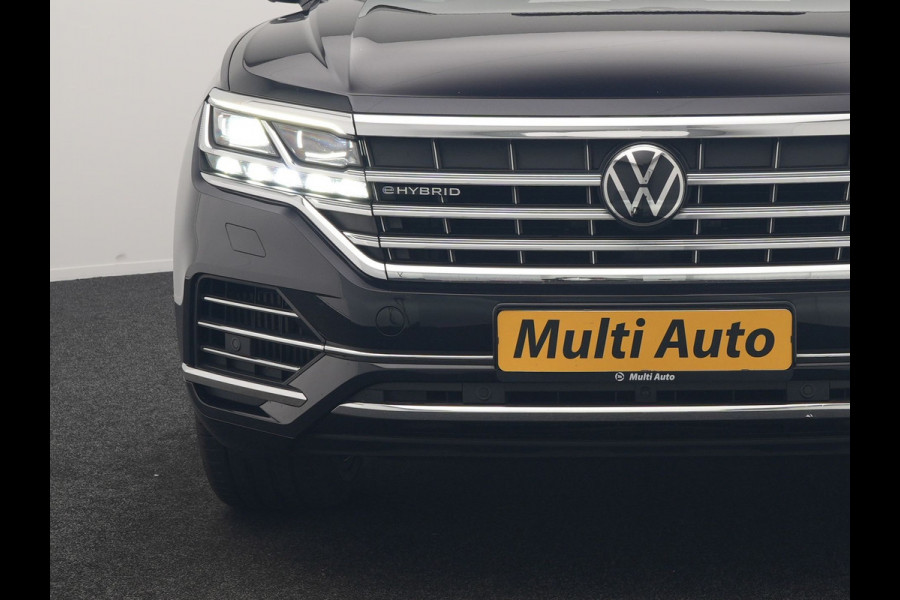 Volkswagen Touareg 3.0 TSi eHybrid 4MOTION PHEV 381pk Dealer O.H | Luchtvering | Trekhaak Af Fabriek | Panodak | Adaptive Cruise | Matrix LED | Lederen Sportstoelen Memory & Verwarmd | Keyless | Apple Carplay | Virtual | Navigatie | DAB | 21"L.M | Plug In Hybrid |