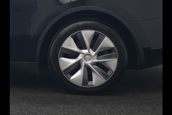 Tesla Model Y Long Range AWD 75 kWh 441pk | Full Self-Driving Capability | Panodak | Adaptive Cruise | Lederen Sportstoelen Memory & Verwarmd | Camera | Navigatie |