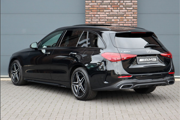 Mercedes-Benz C-Klasse Estate 300 e AMG Line | Distronic | Panoramadak | Memory | Surround Camera | Verwarmd Stuurwiel | Carplay | Sfeerverlichting Premium |