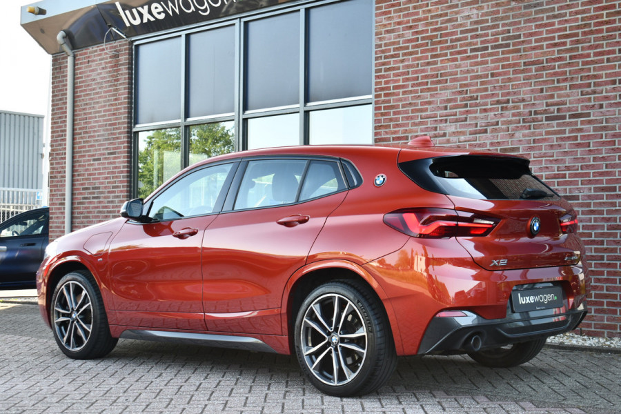 BMW X2 xDrive25e M-Sport | Pano | HUD | Sunset orange | 19 inch | Camera