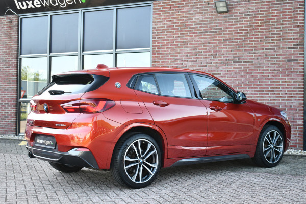 BMW X2 xDrive25e M-Sport | Pano | HUD | Sunset orange | 19 inch | Camera