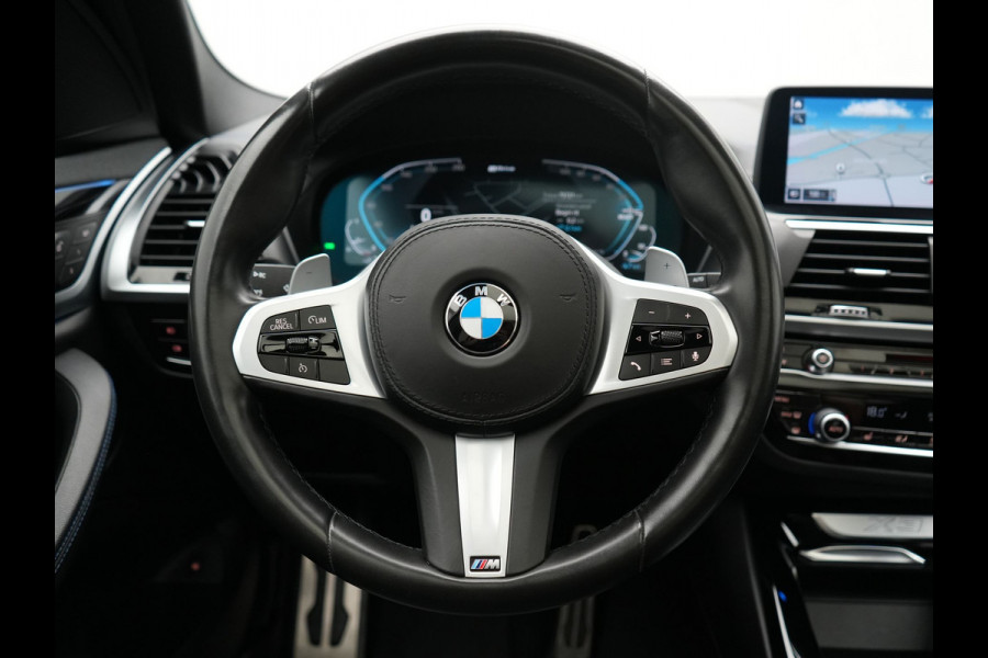 BMW X3 xDrive30e M Sport PHEV 293pk | Trekhaak Afn. | Panodak | Head Up | Camera | Lederen Sportstoelen Memory & Verwarmd | Adaptive LED | Sfeerverlichting | Blis | Keyless | Navigatie | 19"L.M | Plug In Hybrid |