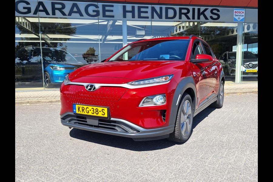 Hyundai Kona EV Fashion 64 kWh | SOH: 95,1% | 3 Fase | Warmtepomp | LED | Blindspot | Stoelverwarming | All Season | HUD |