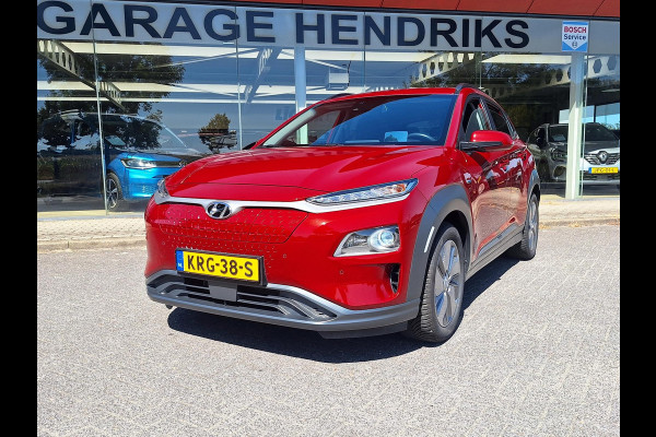 Hyundai Kona EV Fashion 64 kWh | SOH: 95,1% | 3 Fase | Warmtepomp | LED | Blindspot | Stoelverwarming | All Season | HUD |