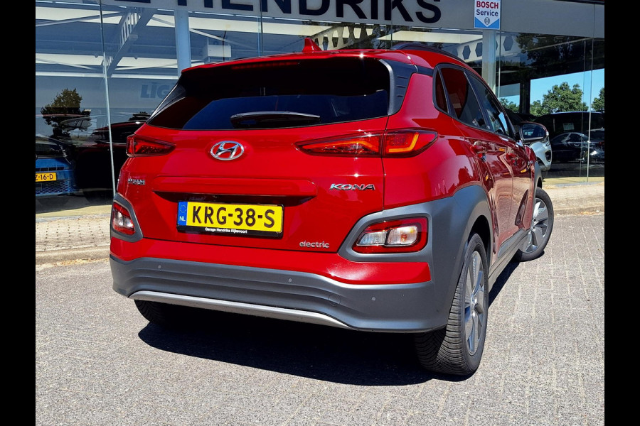 Hyundai Kona EV Fashion 64 kWh | SOH: 95,1% | 3 Fase | Warmtepomp | LED | Blindspot | Stoelverwarming | All Season | HUD |