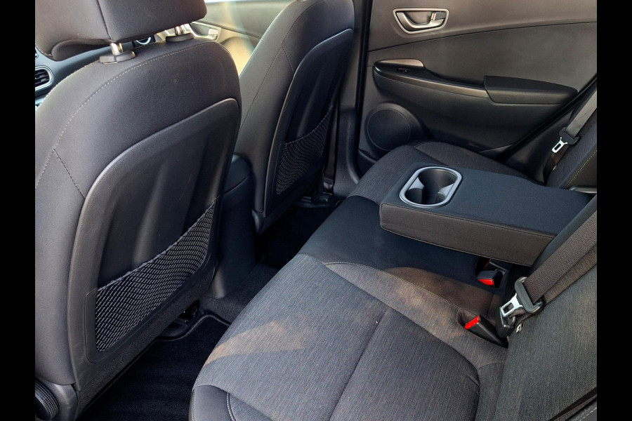 Hyundai Kona EV Fashion 64 kWh | SOH: 95,1% | 3 Fase | Warmtepomp | LED | Blindspot | Stoelverwarming | All Season | HUD |