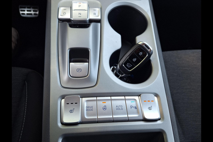 Hyundai Kona EV Fashion 64 kWh | SOH: 95,1% | 3 Fase | Warmtepomp | LED | Blindspot | Stoelverwarming | All Season | HUD |