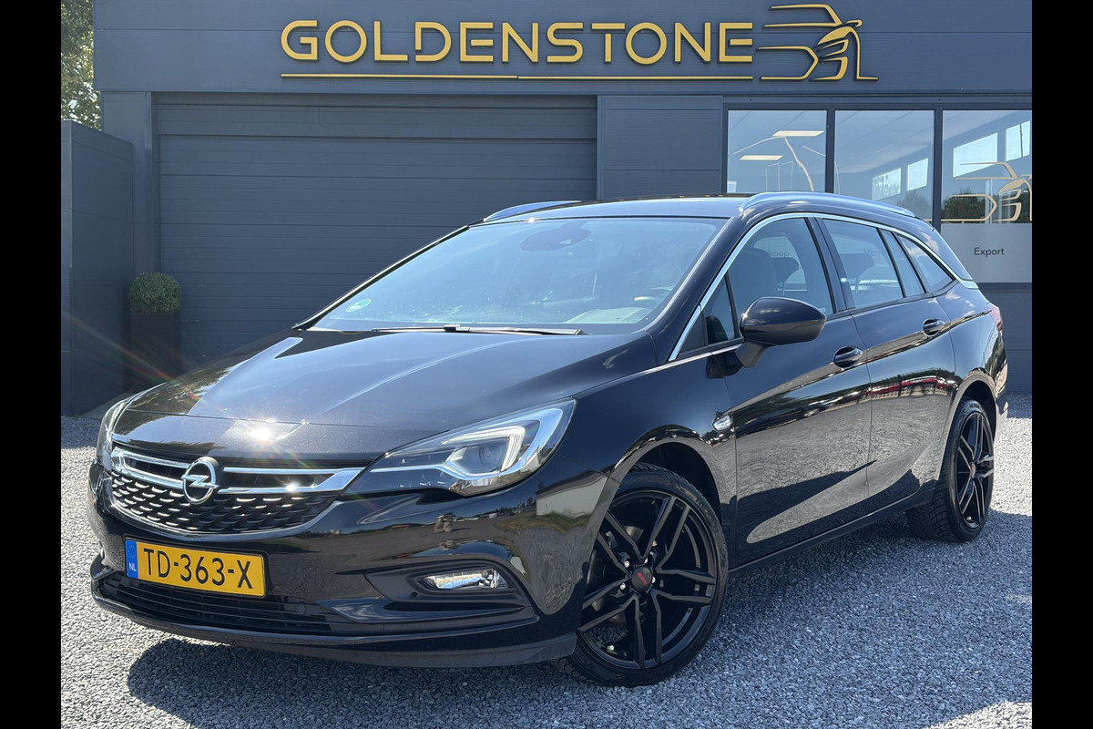Opel Astra Sports Tourer 1.4 Business Executive 2e Eigenaar l 150pk l Carplay l Navi l Pdc V+A l Stoelvw-Stuurverw l Clima l Cruise l 18''Lmv l Halfleder l 6 Bak l Rijstrooksensor l N.A.P l Apk tot 08-2027