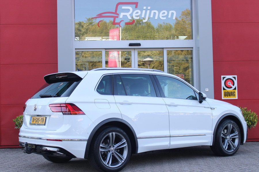 Volkswagen Tiguan 1.5 TSI 150PK AUTOMAAT HIGHLINE BUSINESS R | PANORAMA SCHUIF/KANTEL DAK | LEDEREN BEKLEDING | BESTUUDERSSTOEL ELEKTRISCH VERSTELBAAR MET GEHEUGENFUNCTIE | ELEKTRISCH WEGKLAPBARE TREKHAAK | IQ LIGHT KOPLAMPEN | VIRTUAL DISPLAY | DRAADLOZE APPLE CARPLAY/ANDROID AUTO | NAVIGATIE | 19" LICHTMETALEN VELGEN | ELEKTRISCH BEDIENBARE ACHTERKLEP | GETINTE ACHTERRUITEN | CAMERA VOOR + ACHTER | PARKEERSENSOREN VOOR + ACHTER | STOEL VERWARMING |