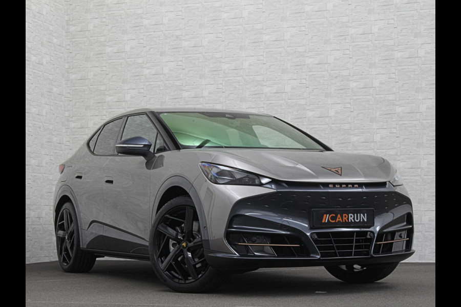 CUPRA Tavascan 286pk 77 kWh | Nieuw! | Winter-Pack | Warmtepomp | Verlengde Fabrieksgarantie | 7x Op Voorraad | Adaptive Cruise Control | 3-Zone Clima | Verwarmde Voorruit | Keyless-Entry | Sfeerverlichting | Stoelverwarming | Carplay | Stuurverwarming | Getint Glas | 19 inch | Lane-Assist | Camera | Draadloos Laden |